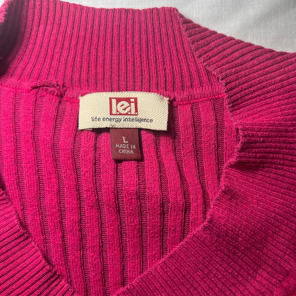 Lei Junior long sleeve V neck knit sweater.